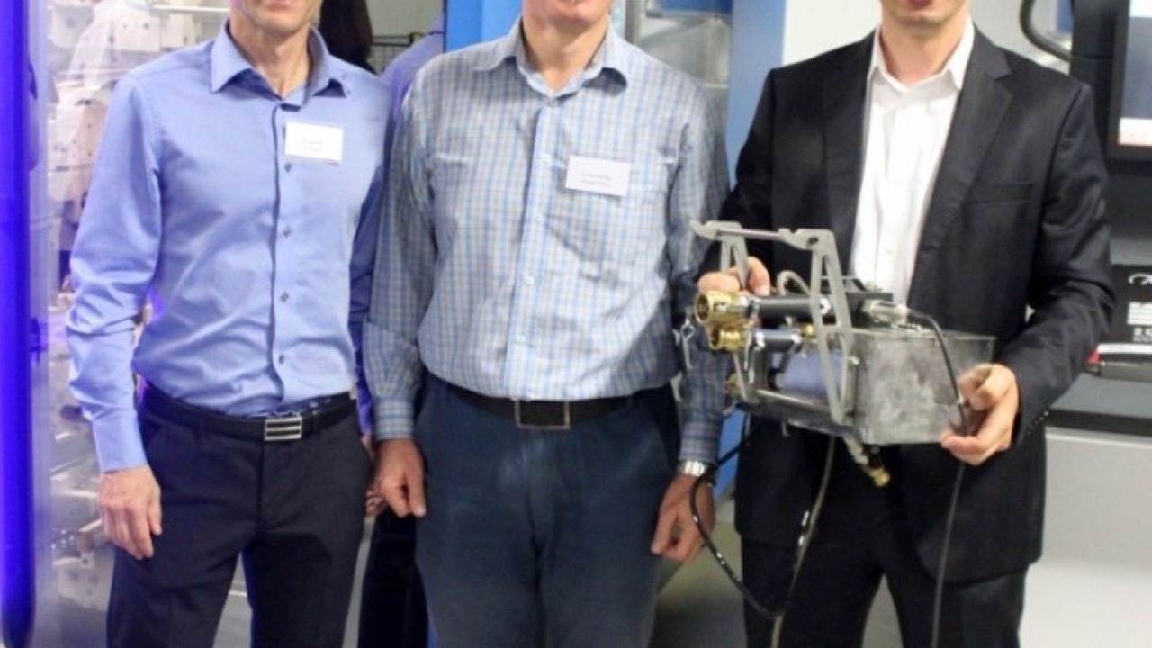 A year ago, Coetzee (center) was the motivating force behind a technical seminar that culminated in a demonstration of a Soma Optima press at Cibapac in Cape Town A year ago, Coetzee (center) was the motivating force behind a technical seminar that culminated in a demonstration of a Soma Optima press at Cibapac in Cape Town