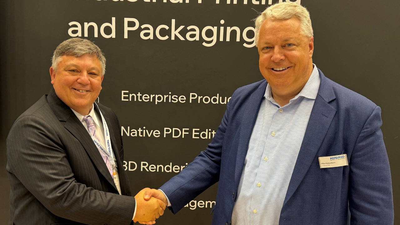 L-R: Pierre Hammond, commercial director of Hamillroad Software and Mike Rottenborn, CEO of Hybrid Software celebrate their new partnership.