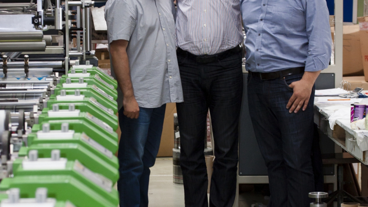 Pictured (from left): Romprix production manager Eduard Toncu, Romprix director Cristian Dobrota and Printman director Mihai Cobianu