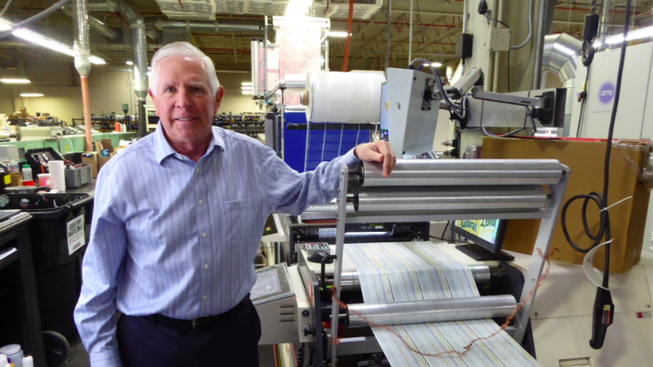 Joel Carmany, president of Consolidated Label, with his latest Nilpeter FA press Joel Carmany, president of Consolidated Label, with his latest Nilpeter FA press