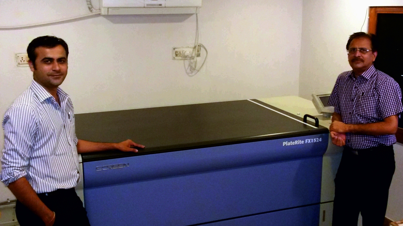 Bakul M. Darji and his son Ankit Darji with India's first Screen flexo CtP Bakul M. Darji and his son Ankit Darji with India's first Screen flexo CtP